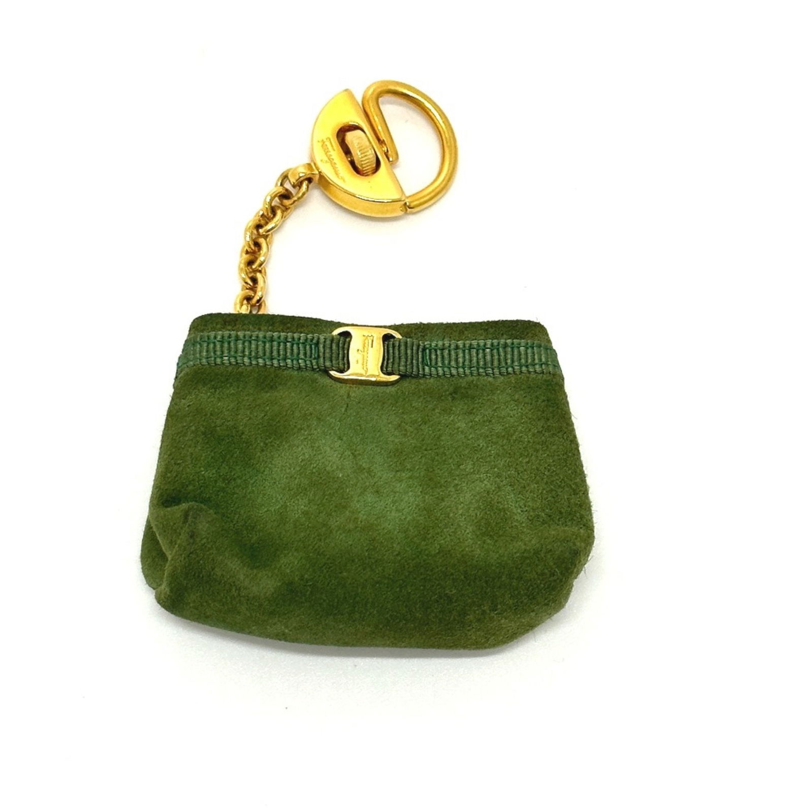 Salvatore Ferragamo Green Leather Handbag Charm for Women: Salvatore Ferragamo Green Leather Handbag Charm for Women Enhance your handbag with this stylish Salvatore Ferragamo Bag Charm in a vibrant green hue. Crafted from high-quality leather, this charm add