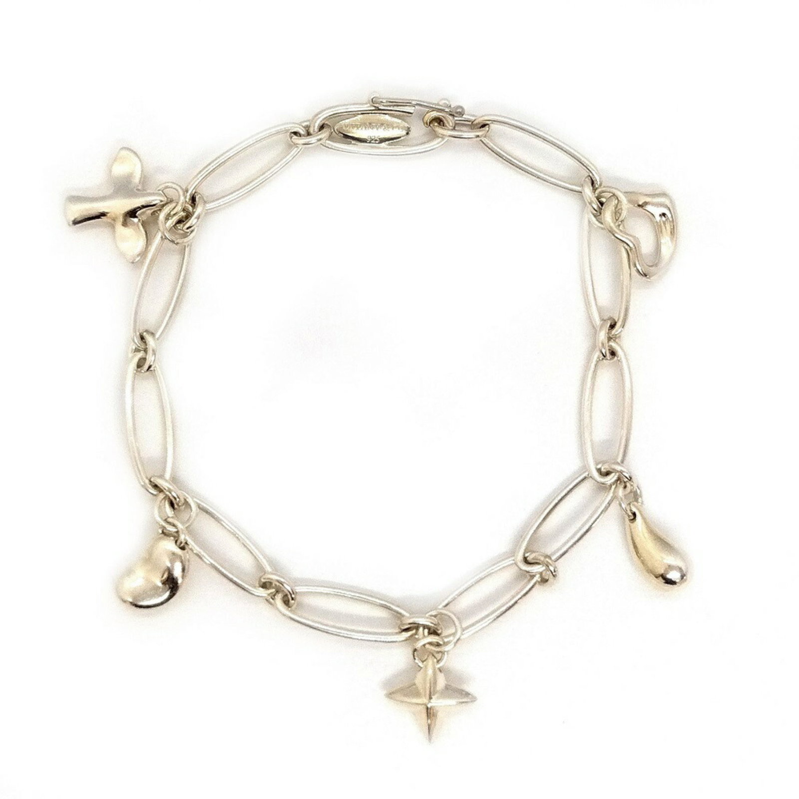 Tiffany & Co. Elsa Peretti 5 Motif Charm Bracelet Silver 925: Tiffany & Co. Elsa Peretti 5 Motif Charm Bracelet Silver 925 This exquisite charm bracelet from Tiffany & Co. features five unique motifs designed by Elsa Peretti, crafted from high-quality Silver 925