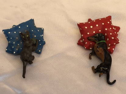 Early 1900s Austrian Enameled Bronze Dog Cat Paperweights: Early 1900s Austrian Enameled Bronze Dog Cat Paperweights This exquisite collection features two early 1900's Austrian enameled bronze paperweights, one depicting a dog and the other a cat, both elega