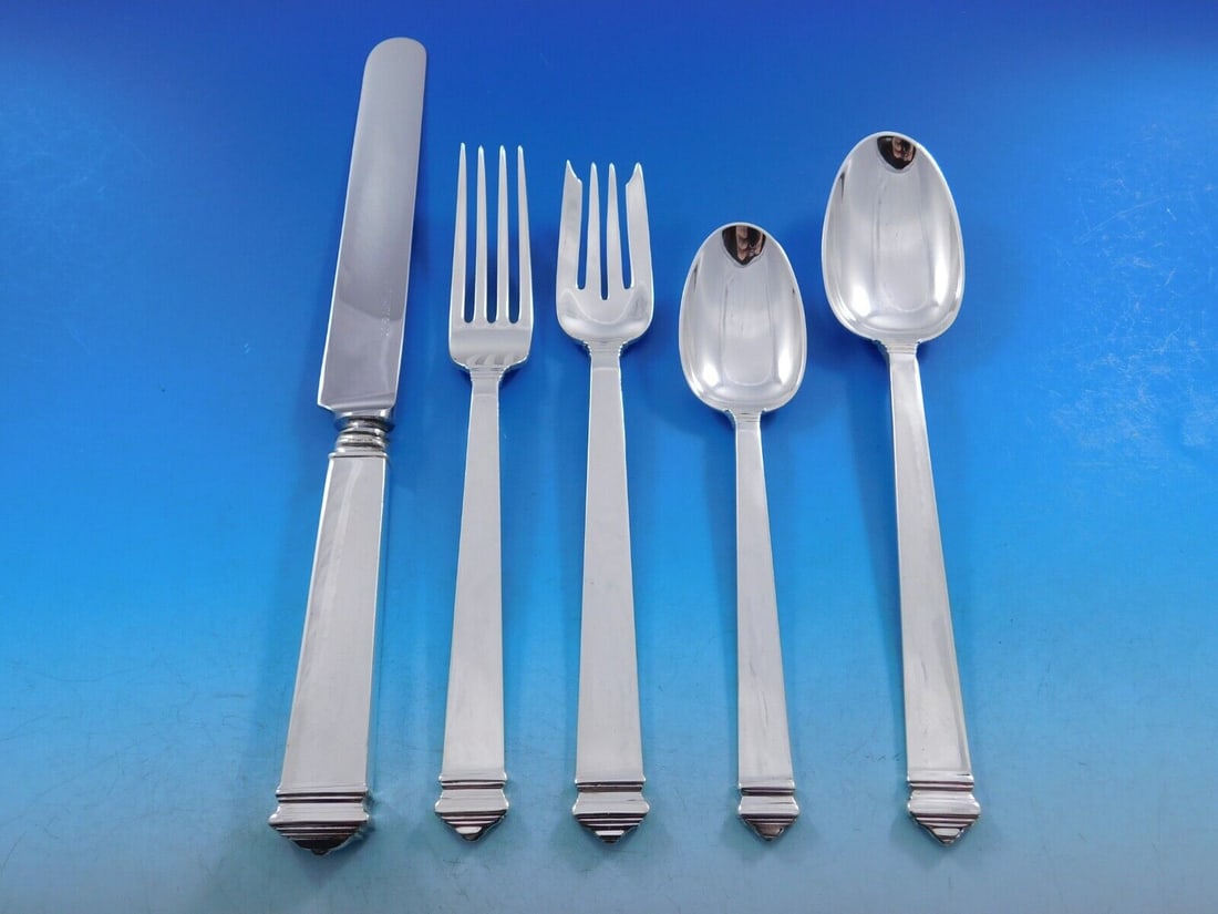 Tiffany & Co. Hampton Sterling Silver Flatware Set 63 pcs for 12 Art Deco: Tiffany & Co. Hampton Sterling Silver Flatware Set 63 pcs for 12 Art Deco Discover the timeless elegance of the Hampton by Tiffany Sterling Silver Flatware Set, designed for 12 and comprising 63 exqui