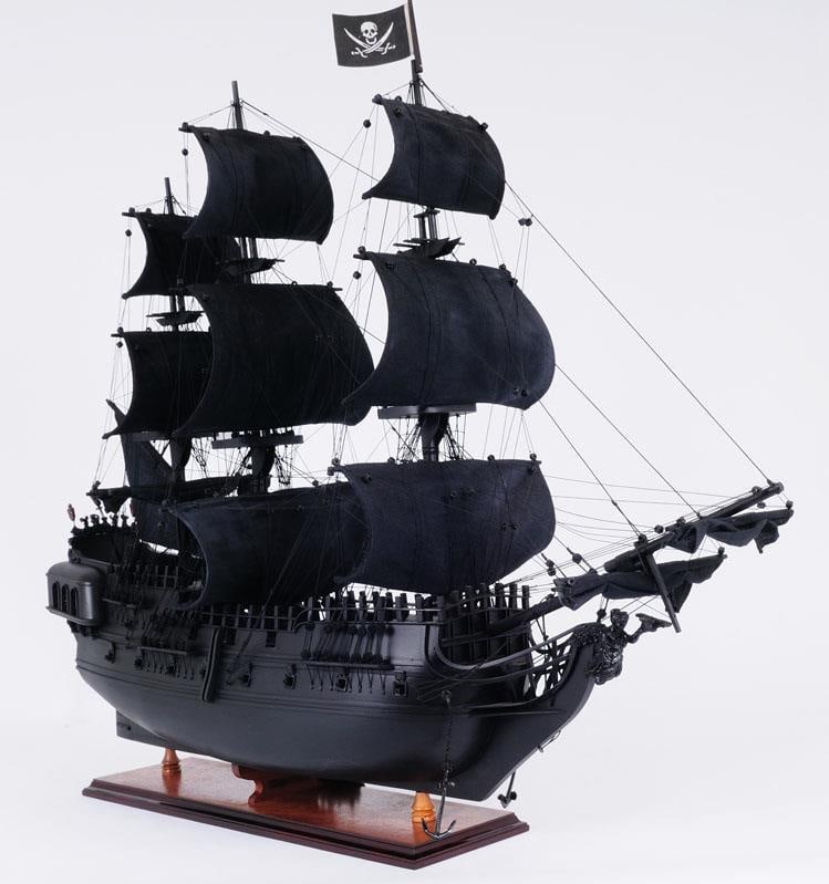 Handcrafted Black Pearl Pirate Ship Model 24H 28W 8D Dark Finish: Handcrafted Black Pearl Pirate Ship Model 24H 28W 8D Dark Finish This handcrafted Black Pearl Pirate Ship replica is a stunning addition to any collection. It features intricate details and is made fr