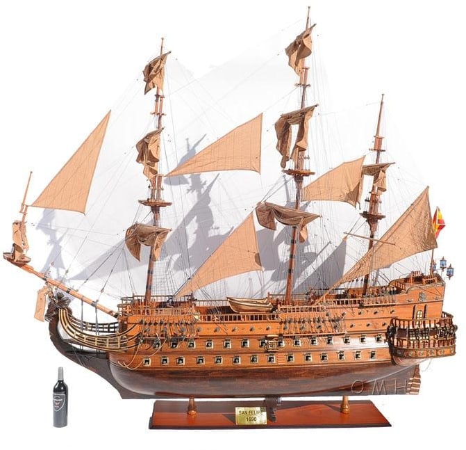 Massive Handcrafted San Felipe Galleon Ship Model: Massive Handcrafted San Felipe Galleon Ship Model This exquisite San Felipe ship model showcases a stunning Spanish Colonial design, meticulously handcrafted to capture the intricate details of a clas