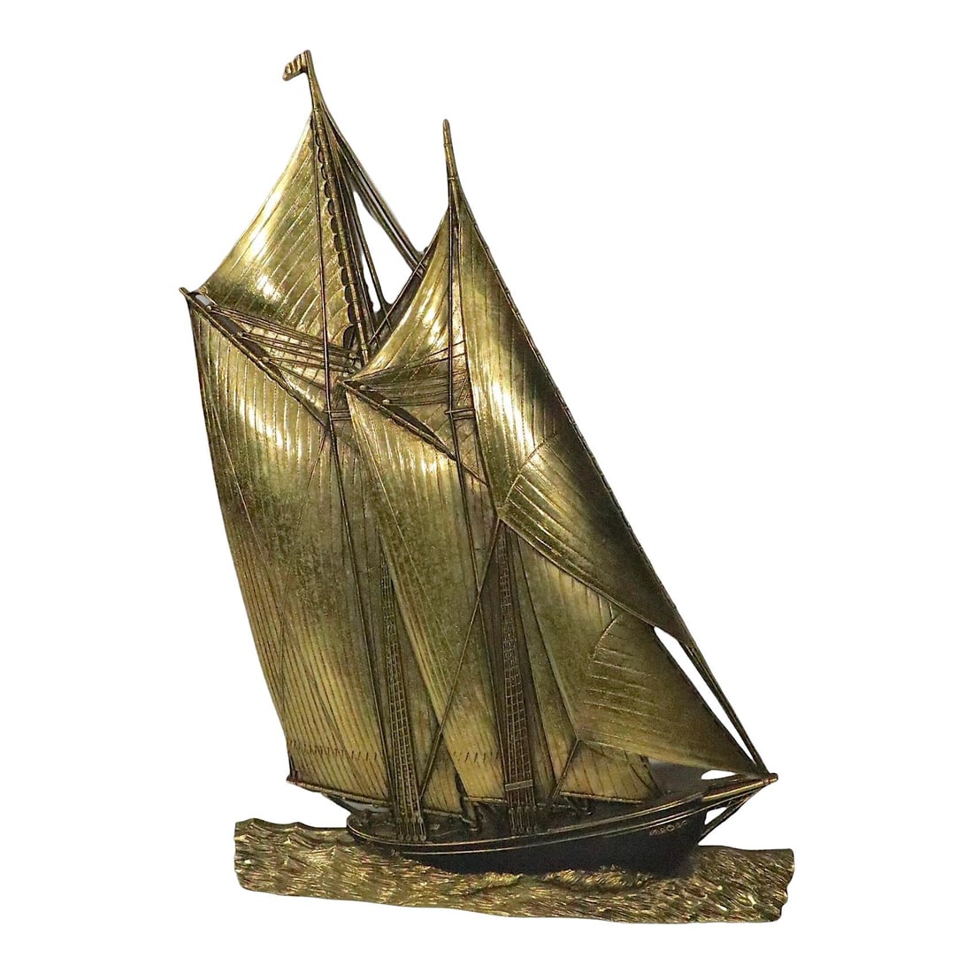 Brass Finish Plastic Wall Hanging of Full Sail Sailboat 1972: Brass Finish Plastic Wall Hanging of Full Sail Sailboat 1972 This striking wall hanging features a sailboat in full sail, crafted from cast plastic with a stunning faux brass finish. Marked by Dart In