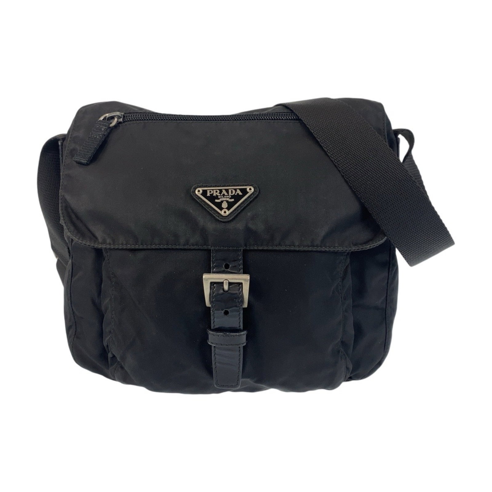 Prada Black Nylon Triangle Logo Crossbody Shoulder Bag: Prada Black Nylon Triangle Logo Crossbody Shoulder Bag This stylish Prada messenger bag is crafted from durable nylon in a sleek black color. It features a prominent triangle logo plate and silver har