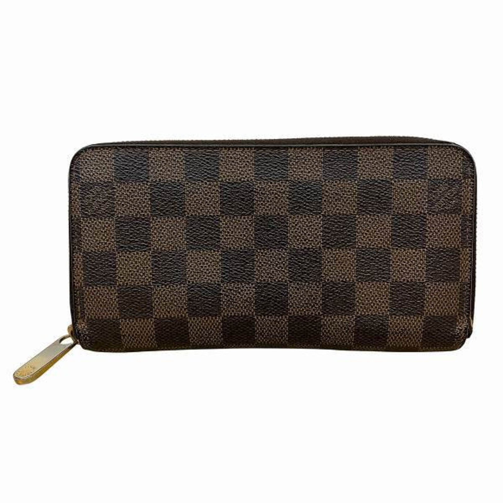 Louis Vuitton Damier Ebene Zippy Wallet N60015 Brown Bi-Fold: Louis Vuitton Damier Ebene Zippy Wallet N60015 Brown Bi-Fold Introducing the Louis Vuitton Damier Ebene Zippy Wallet, a stylish long wallet designed for both men and women. This wallet features a clas