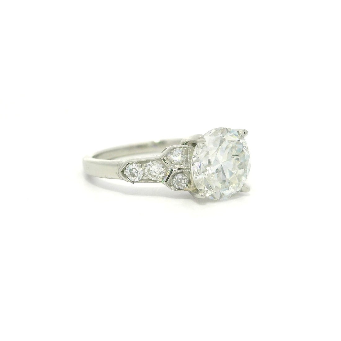Antique Art Deco Platinum 1.59ct Old European Diamond Ring: Antique Art Deco Platinum 1.59ct Old European Diamond Ring This exquisite Antique Art Deco ring features a stunning 1.59ct Old European cut diamond with a classic mosaic shoulder design. Crafted from 
