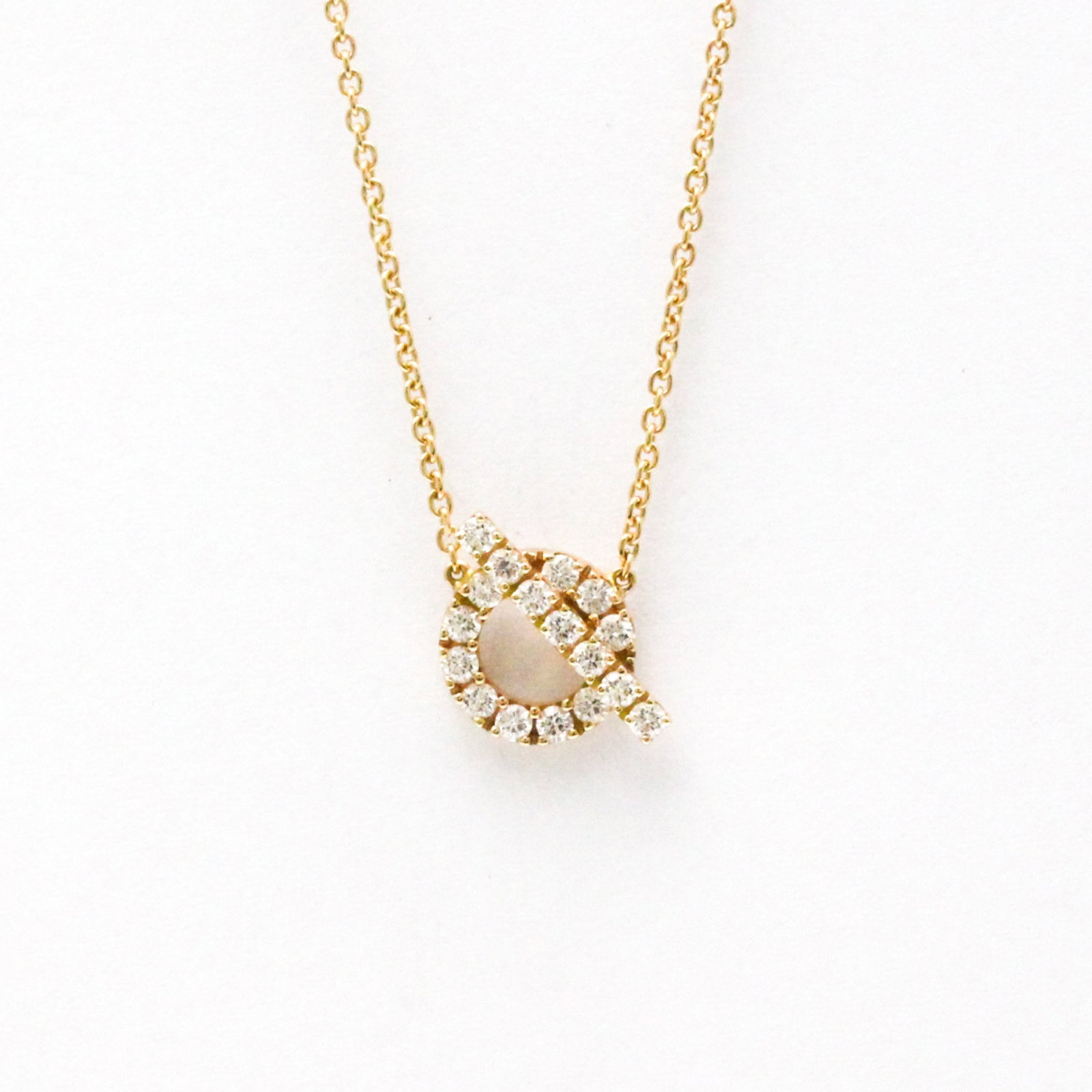 Hermes Finesse 18K Pink Gold Diamond Pendant Necklace Unisex: Hermes Finesse 18K Pink Gold Diamond Pendant Necklace Unisex Elevate your style with the Hermes Finesse Pendant Necklace, a stunning piece crafted from 18K pink gold. Designed for both men and women, 