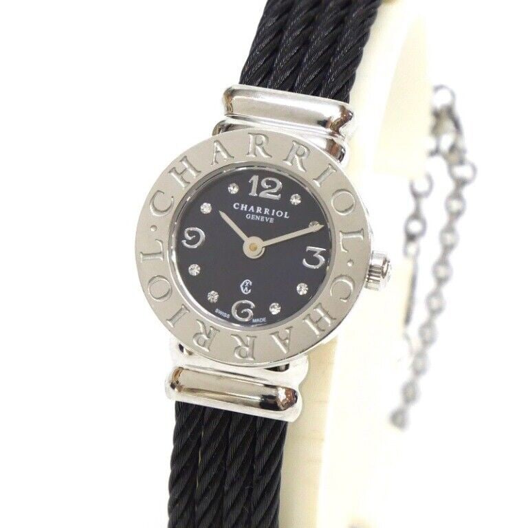Philippe Charriol Saint-Tropez Quartz Ladies Watch 20.5mm Black Bracelet 8P Diamonds: Philippe Charriol Saint-Tropez Quartz Ladies Watch 20.5mm Black Bracelet 8P Diamonds Introducing the Philippe Charriol Saint-Tropez Quartz Ladies Watch, a stunning wristwatch that combines elegance wi