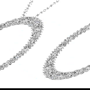 Circle Frame Diamond 1/2 Ct.Tw. Pendant: Circle Frame Diamond 1/2 Ct.Tw. Pendant Created in 10K White Gold, this open circle-shaped design is completely outlined with shimmering 1/2 Ct.Tw. diamond accents. Polished to a bright