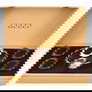GUCCI Ladies Gold Plated Changeable Bezel Quartz Watch White Dial: GUCCI Ladies Gold Plated Changeable Bezel Quartz Watch White Dial This elegant GUCCI ladies' wristwatch features a changeable bezel design, allowing you to customize its look with six vibrant