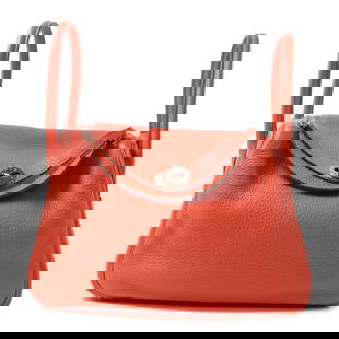 HERMES Lindy 26 2 Way Bag Rouge Tomate Red Calfskin: HERMES Lindy 26 2 Way Bag Rouge Tomate Red Calfskin Presenting the HERMES Lindy 26 2 Way Bag, a stylish and versatile accessory crafted from premium calfskin leather in a striking Rouge Tomate red. Th