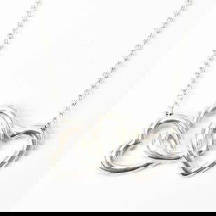 Tiffany & Co. Elsa Peretti Triple Heart Pendant Necklace in Sterling Silver 40cm: Tiffany & Co. Elsa Peretti Triple Heart Pendant Necklace in Sterling Silver 40cm This exquisite Tiffany & Co. necklace features a stunning triple heart motif designed by Elsa Peretti. Crafted from hig