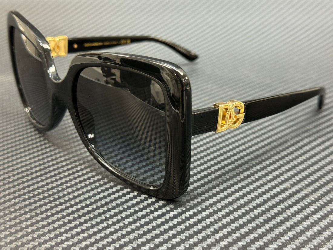 Dolce&Gabbana DG6193U Black Grey Gradient Women's Sunglasses 56mm: Dolce&Gabbana DG6193U Black Grey Gradient Women's Sunglasses 56mm Elevate your style with these stunning Dolce & Gabbana DG6193U sunglasses. Featuring a sleek black frame with a sophisticated grey gra