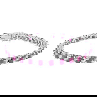 Rachel Koen 14K White Gold Ruby Diamond Tennis Bracelet 10.15 Carats: Rachel Koen 14K White Gold Ruby Diamond Tennis Bracelet 10.15 Carats This exquisite tennis bracelet features a stunning emerald cut ruby complemented by sparkling diamonds, masterfully set in luxuriou