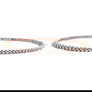 Contemporary 1.85ct Diamond Tennis Bangle Bracelet in 14k Rose Gold: Contemporary 1.85ct Diamond Tennis Bangle Bracelet in 14k Rose Gold 1.85ct Diamond Flexible Tennis Bangle Bracelet Rose Gold. Metal: Gold, 14k Gold, Rose Gold. Stone: Diamond. Stone Cut: Round Cut. We