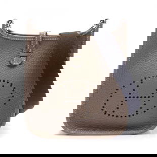 Hermes Evelyn TPM Shoulder Bag Brown Taurillon Clemence 18cm Silver Hardware: Hermes Evelyn TPM Shoulder Bag Brown Taurillon Clemence 18cm Silver Hardware Introducing the exquisite Hermes Evelyn TPM Shoulder Bag, crafted from luxurious Taurillon clemence leather in a sophistica
