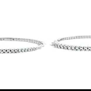 14k White Gold 2.33ct Diamond Flexible Tennis Bangle Bracelet 7in USA: 14k White Gold 2.33ct Diamond Flexible Tennis Bangle Bracelet 7in USA This exquisite contemporary diamond flexible tennis bangle bracelet, crafted from 14k white gold, features a stunning array of 64