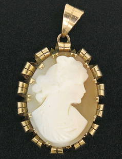 Antique Victorian 14k Rose Gold Hand Carved Shell Cameo Pendant: Antique Victorian 14k Rose Gold Hand Carved Shell Cameo Pendant This exquisite Antique Victorian pendant features a hand-carved shell cameo set in a beautifully curled frame, crafted from 14k rose gol