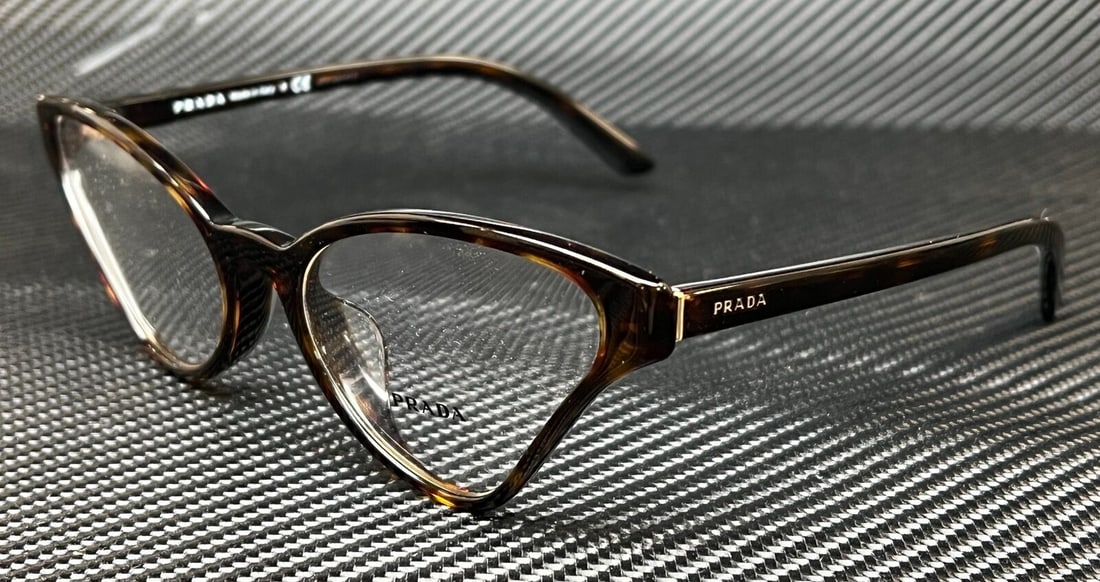 PRADA PR 06XVF 2AU1O1 Cat Eye Havana Eyeglasses 56mm: PRADA PR 06XVF 2AU1O1 Cat Eye Havana Eyeglasses 56mm Introducing the PRADA PR 06XVF 2AU1O1 Women's Eyeglasses, a stunning pair of cat-eye frames designed for elegance and style. Crafted from high-qual