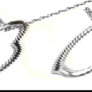 Tiffany & Co. Sterling Silver Heart Necklace for Women: Tiffany & Co. Sterling Silver Heart Necklace for Women This elegant Tiffany heart necklace is crafted from high-quality sterling silver, making it a perfect accessory for women. The necklace features