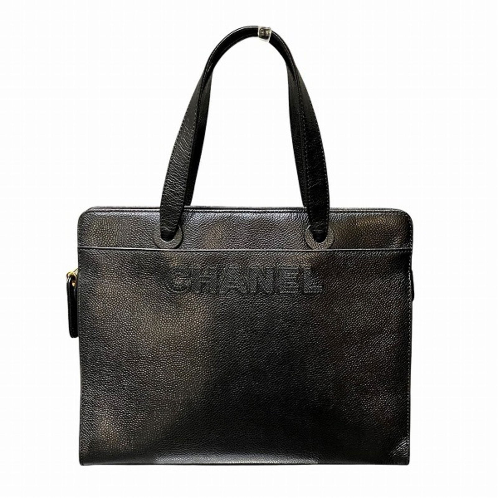 Chanel Black Grained Calfskin Tote Handbag with G Hardware: Chanel Black Grained Calfskin Tote Handbag with G Hardware This elegant Chanel tote bag is crafted from luxurious grained calfskin in a classic black color. Designed specifically for women, it feature