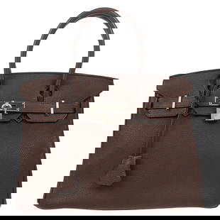 Hermes Birkin 30 Chocolat Togo Handbag with Silver Hardware: Hermes Birkin 30 Chocolat Togo Handbag with Silver Hardware Introducing the exquisite Hermes Chocolat Togo Birkin 30 Handbag, a luxurious accessory that perfectly blends style and functionality. Craft