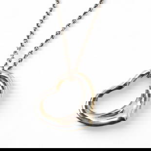 Tiffany & Co. Heart Pendant Necklace Sterling Silver 40cm: Tiffany & Co. Heart Pendant Necklace Sterling Silver 40cm This exquisite Tiffany necklace features a charming heart pendant crafted from high-quality 925 sterling silver. Designed for women, the neckl