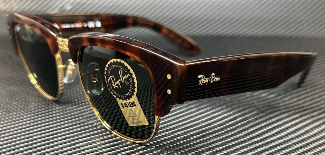 Ray-Ban RB0316S Mega Clubmaster Tortoise Green 53mm Unisex Sunglasses: Ray-Ban RB0316S Mega Clubmaster Tortoise Green 53mm Unisex Sunglasses Experience timeless style with the Ray-Ban RB0316S 990 31 Tortoise Green Mega Clubmaster Sunglasses. Featuring a classic design th