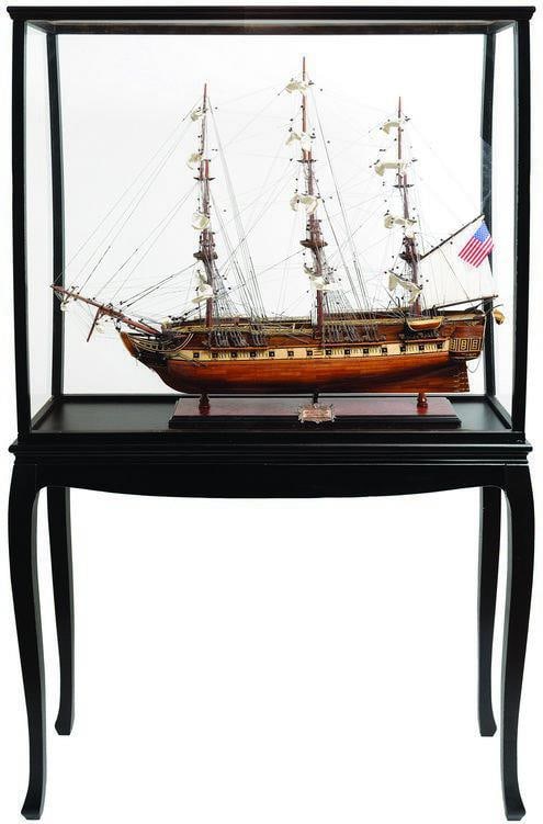 Handmade Nautical Model in Dark Mahogany Case: Handmade Nautical Model in Dark Mahogany Case This museum-quality model ship is elegantly displayed in a handcrafted dark mahogany case, showcasing intricate details including multiple sails and an Am
