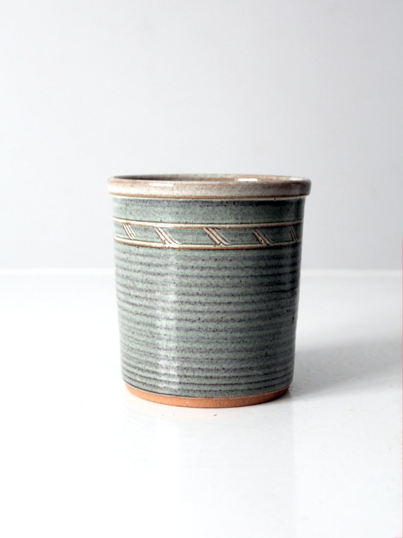 Artist Signed Vintage Studio Pottery Cache Pot Vase Celadon Green 5": Artist Signed Vintage Studio Pottery Cache Pot Vase Celadon Green 5" This is a vintage studio pottery cachepot. Signed by the artist, the handmade, wheel turned vase has a delicate etched design acros