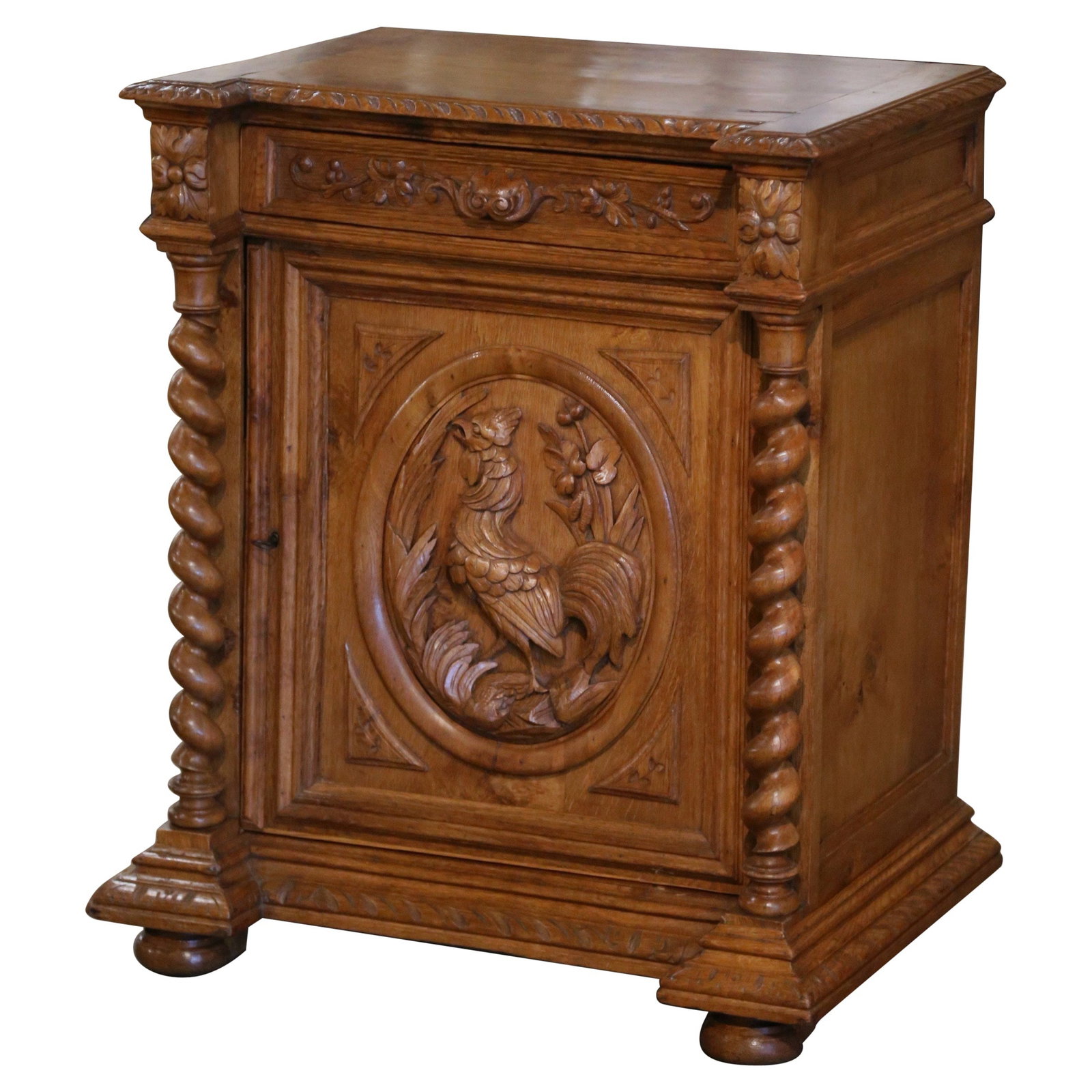 19th Century Louis XIII Oak Jelly Cabinet with Rooster Motif: 19th Century Louis XIII Oak Jelly Cabinet with Rooster Motif This exquisite 19th Century French Louis XIII Oak Barley Twist Jelly Cabinet showcases a stunning Rooster motif, adding a touch of elegance