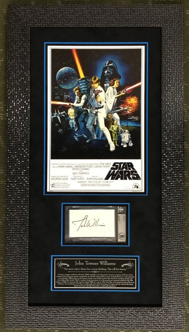 John Williams Star Wars Signed 5 x 7 Cut Signature Framed Display Beckett: John Williams Star Wars Signed 5 x 7 Cut Signature Framed Display Beckett Celebrate the legacy of film music with this custom framed display featuring a 5" x 7" cut signature card signed by John Willi