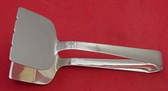Allan Adler Sunset Sterling Silver Sandwich Tong 7 3/4": Allan Adler Sunset Sterling Silver Sandwich Tong 7 3/4" This exquisite sandwich tong is part of the Sunset pattern by Allan Adler, crafted from high-quality sterling silver. Measuring 7 3/4 inches,