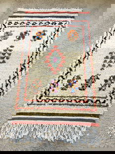 Handmade Moroccan Amazigh Rug 27" x 47.5": Handmade Moroccan Amazigh Rug 27" x 47.5" Experience the exquisite artistry of Moroccan craftsmanship with this authentic handmade Amazigh rug. Woven by skilled Amazigh women in the Atlas Mountains, e