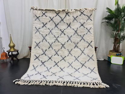 Handmade Moroccan Berber White Wool Rug 5 x 3.28 Feet: Handmade Moroccan Berber White Wool Rug 5 x 3.28 Feet Enhance your living space with this beautiful soft handmade Moroccan Berber white wool rug, featuring striking black designs throughout. Crafted b