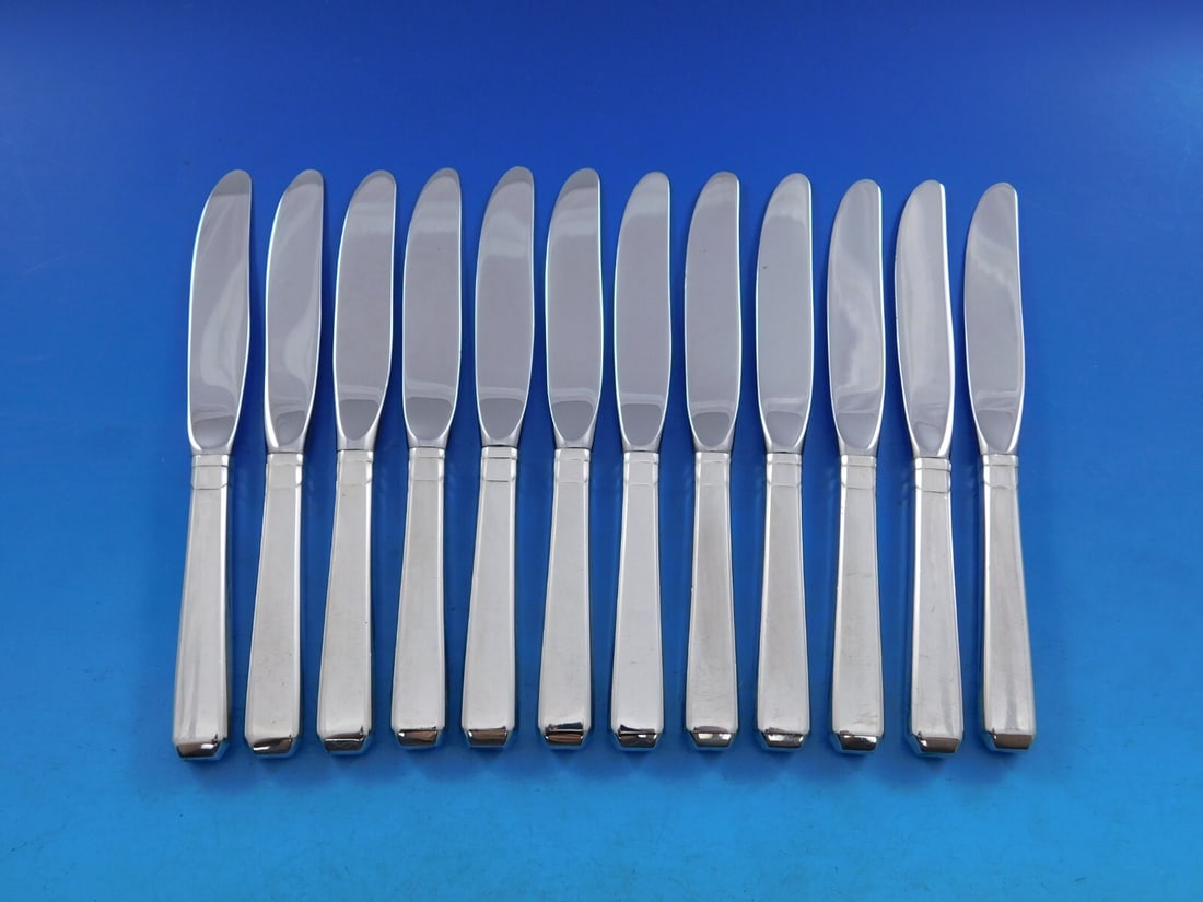 Towle Craftsman Sterling Silver Butter Spreaders Set of 12: Towle Craftsman Sterling Silver Butter Spreaders Set of 12 Enhance your dining experience with this exquisite set of 12 butter spreaders from the Craftsman pattern by Towle. Crafted from high-quality 