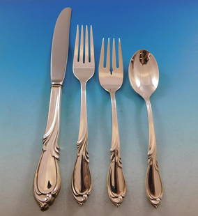 Rhapsody New International Sterling Silver Flatware Set 32 Pieces for 8 Service: Rhapsody New International Sterling Silver Flatware Set 32 Pieces for 8 Service Discover the elegance of the Rhapsody New by International Sterling Silver Flatware Set, featuring 32 beautifully crafte