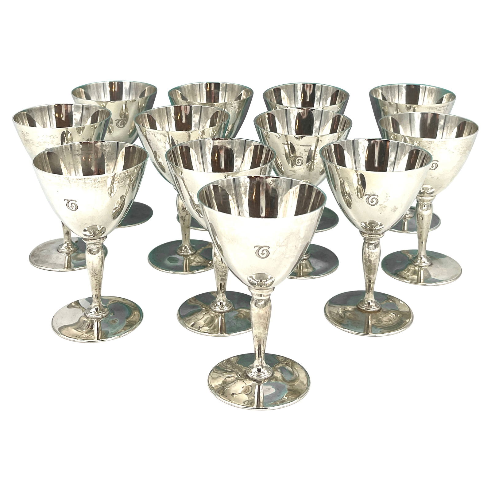 12 Tiffany Art Deco Sterling Silver Goblets Set 1907-1947: 12 Tiffany Art Deco Sterling Silver Goblets Set 1907-1947 Elevate your dining experience with this exquisite set of 12 Tiffany Art Deco Sterling Goblets, crafted between 1907 and 1947 in the USA. Each
