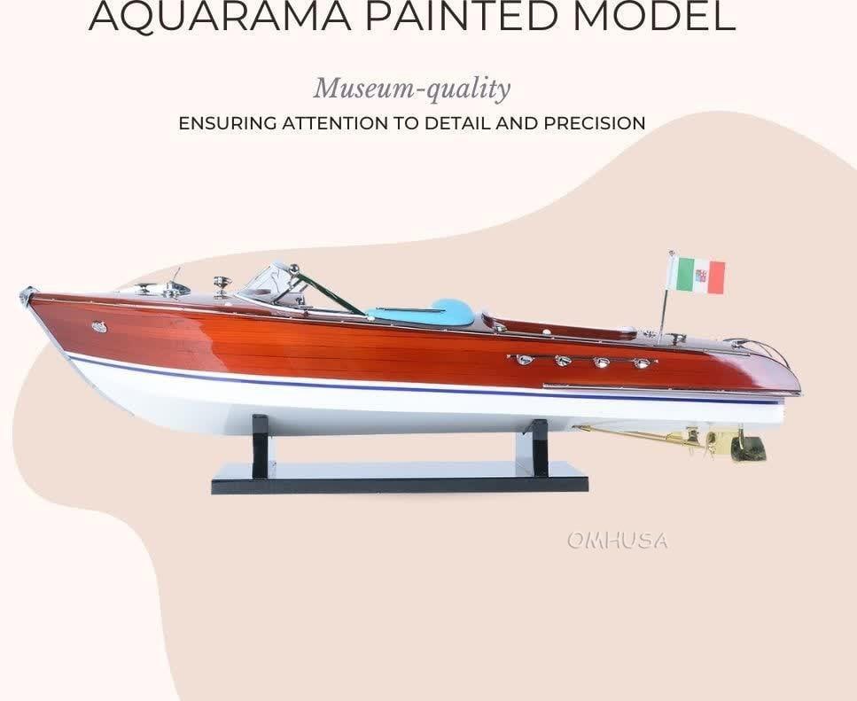 Exquisite Riva Aquarama Model in Brass: Exquisite Riva Aquarama Model in Brass This exquisite model of the Riva Aquarama is a stunning hand-crafted piece made from high-quality mahogany, showcasing exceptional craftsmanship. With a height o