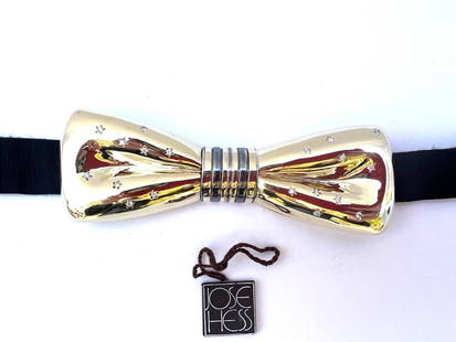 Jose Hess 14K Gold Diamond Bow Tie with Certificate and Box: Jose Hess 14K Gold Diamond Bow Tie with Certificate and Box Discover the exquisite craftsmanship of this unique bow tie, meticulously designed by renowned goldsmith Jose Hess. Made from 14K yellow gol