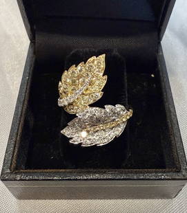 CJ French 14K Multi-Tone Gold Colored Diamond Ring Size 7: CJ French 14K Multi-Tone Gold Colored Diamond Ring Size 7 This exquisite French ring, size 7, is crafted from 14k yellow and white gold, featuring a stunning array of colored diamonds. Weighing 5.30 g