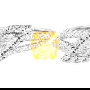 1.79ct Fancy Yellow Cushion Diamond Ring 18k Two-Tone Size 6.5 EGL Certified: 1.79ct Fancy Yellow Cushion Diamond Ring 18k Two-Tone Size 6.5 EGL Certified This exquisite 1.79ctt Fancy Yellow Cushion VS1 Diamond Ring features a stunning modern design with a halo setting. The rin