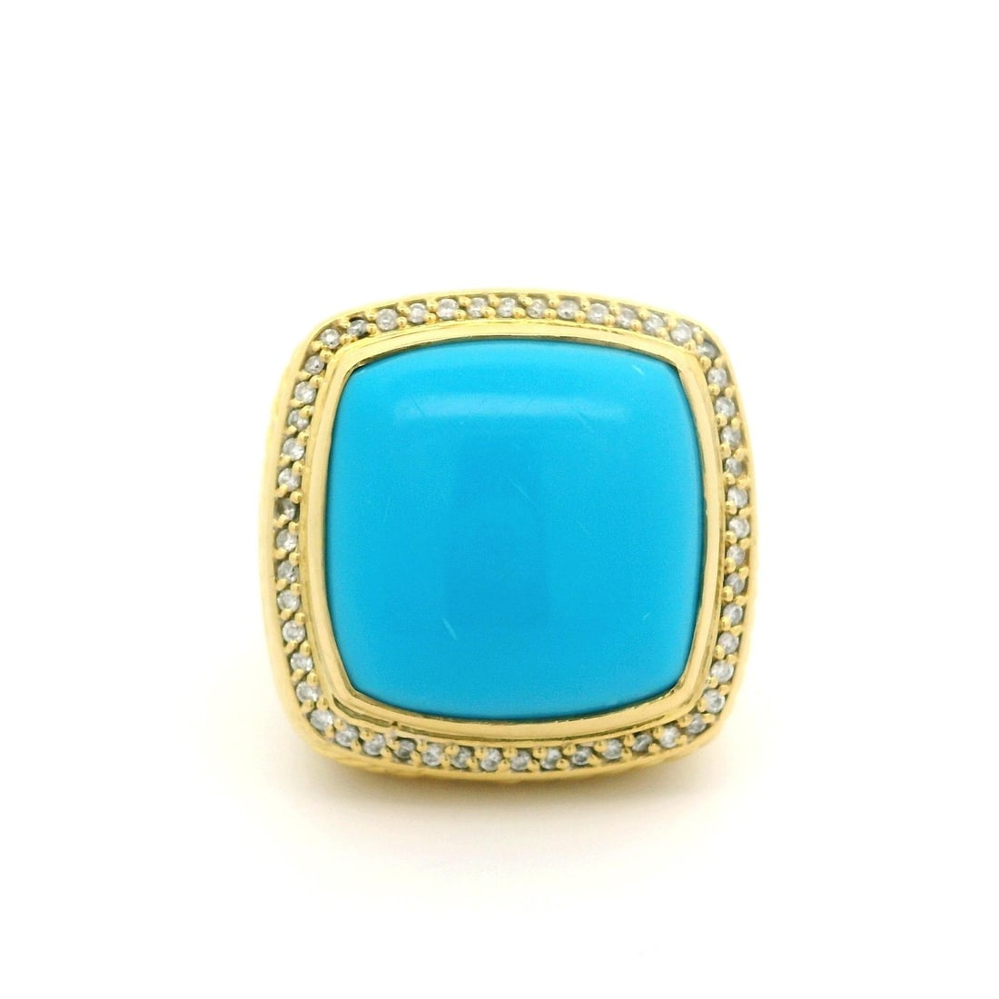 David Yurman Albion 18k Yellow Gold Turquoise Diamond Cocktail Ring: David Yurman Albion 18k Yellow Gold Turquoise Diamond Cocktail Ring This exquisite David Yurman Albion ring features a stunning turquoise cabochon as its centerpiece, complemented by sparkling diamond