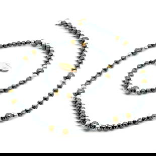Elegant 14k Yellow Gold Hematite Bead Necklace 18 Inch: Elegant 14k Yellow Gold Hematite Bead Necklace 18 Inch This elegant 14k yellow gold necklace features natural hematite beads, beautifully complementing the rich yellow gold. The beaded design adds a t