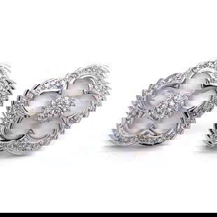 Stunning 18K White Gold Flower Earrings with 0.62 Ct Diamonds: Stunning 18K White Gold Flower Earrings with 0.62 Ct Diamonds These stunning 18K White Gold Crystal & Diamond Flower Earrings feature a beautifully crafted floral design adorned with sparkling diamond