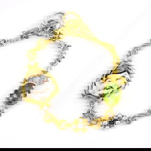 Tesoro 18k Yellow Gold Diamond Gem Enamel Charm Bracelet 9.72ct: Tesoro 18k Yellow Gold Diamond Gem Enamel Charm Bracelet 9.72ct This exquisite contemporary Tesoro bracelet is a stunning piece crafted from 18k yellow gold. It features a unique scroll link chain ado