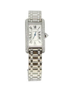 Cartier Tank Americaine 18K White Gold Diamond Watch Ref 1713 Authentic Box Papers: Cartier Tank Americaine 18K White Gold Diamond Watch Ref 1713 Authentic Box Papers This exquisite Cartier Tank Americaine watch showcases a stunning diamond bezel and is crafted from 18K white gold. T