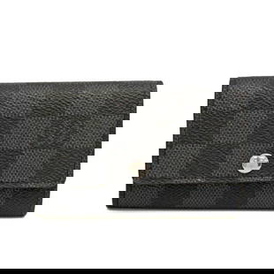 Louis Vuitton Damier Graphite Multicles 6 Key Case 7cm x 10.5cm: Louis Vuitton Damier Graphite Multicles 6 Key Case 7cm x 10.5cm Elevate your accessory collection with the Louis Vuitton Damier Graphite Multicles 6 key case, designed for both men and women. This sty
