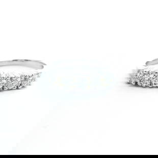 Stunning 14K White Gold 5 Stone Diamond Wedding Band Ring: Stunning 14K White Gold 5 Stone Diamond Wedding Band Ring This exquisite 14k white gold wedding band ring features a stunning arrangement of five brilliant cut diamonds, showcasing a total carat weigh
