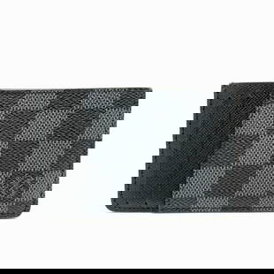 Louis Vuitton N62666 Black Business Card Holder for Men 11cm x 7cm: Louis Vuitton N62666 Black Business Card Holder for Men 11cm x 7cm Elevate your professional style with this Louis Vuitton N62666 business card holder. Crafted in a sleek black color, this card case i